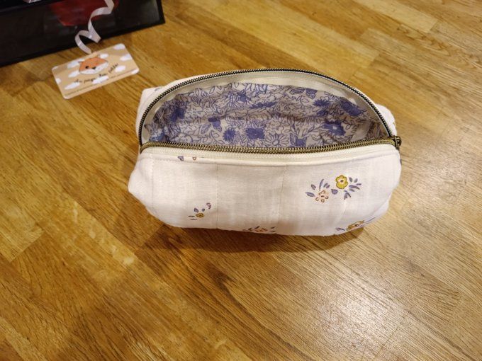 Trousse à maquillage matelassé fleurs bleu